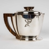 Service à thé et à café égoïste argent massif et macassar de Jean E. PUIFORCAT | Biron Service à thé et à café égoïste argent massif et macassar de Jean E. PUIFORCAT