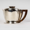 Service à thé et à café égoïste argent massif et macassar de Jean E. PUIFORCAT | Biron Service à thé et à café égoïste argent massif et macassar de Jean E. PUIFORCAT