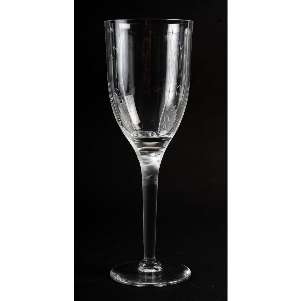 Suite de 10 flûtes à champagne « Ange de Reims » cristal blanc de Marc LALIQUE | Biron Suite de 10 flûtes à champagne "Ange de Reims" cristal blanc de Marc LALIQUE