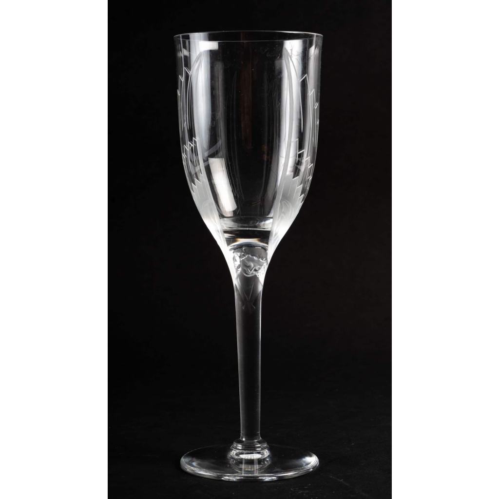 Suite de 10 flûtes à champagne « Ange de Reims » cristal blanc de Marc LALIQUE | Biron Suite de 10 flûtes à champagne "Ange de Reims" cristal blanc de Marc LALIQUE