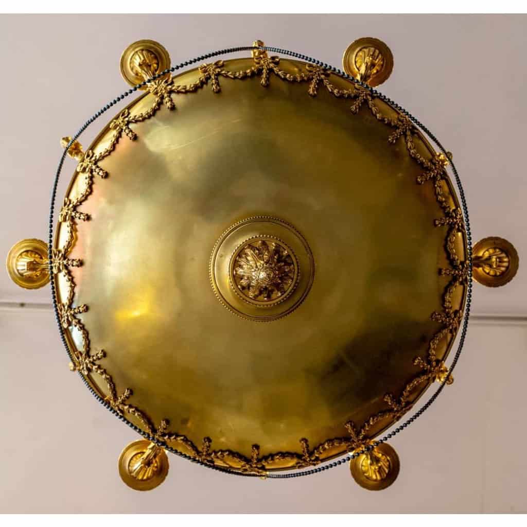 Joli lustre néo-classique, style Louis XVI, en bronze doré | Biron Joli lustre néo-classique, style Louis XVI, en bronze doré