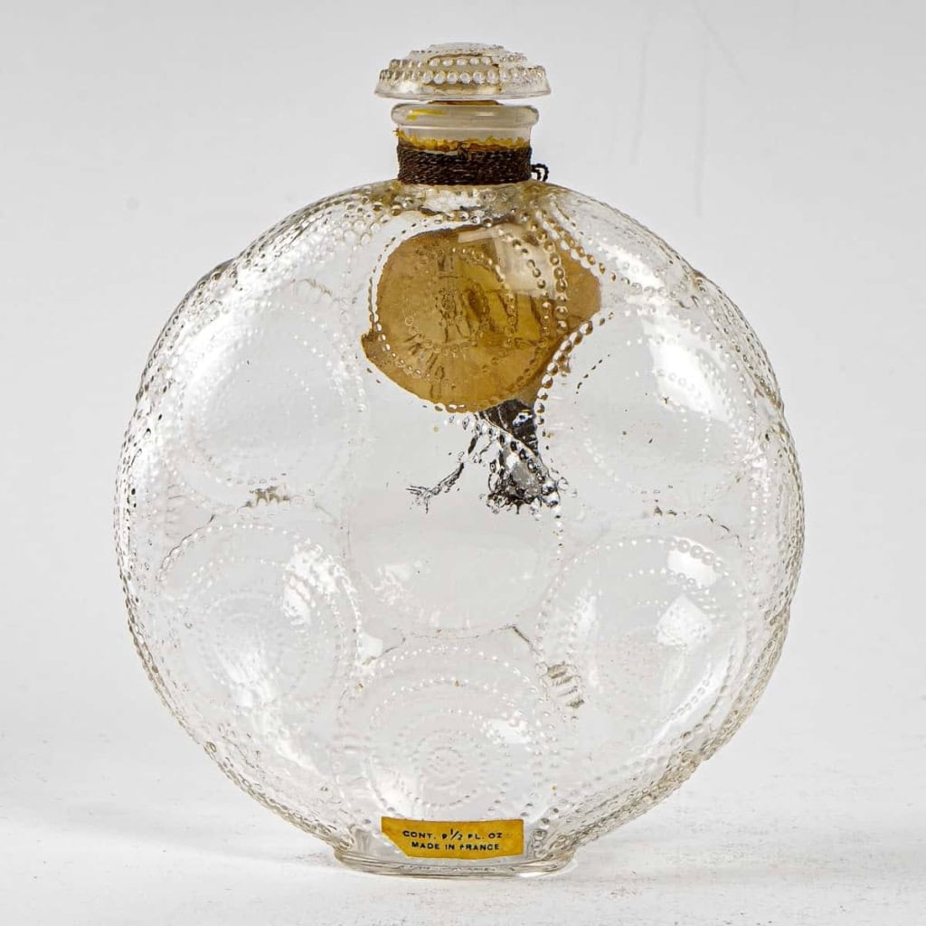 Flacon « Relief » verre blanc de René LALIQUE pour FORVIL | Biron Flacon "Relief" verre blanc de René LALIQUE pour FORVIL
