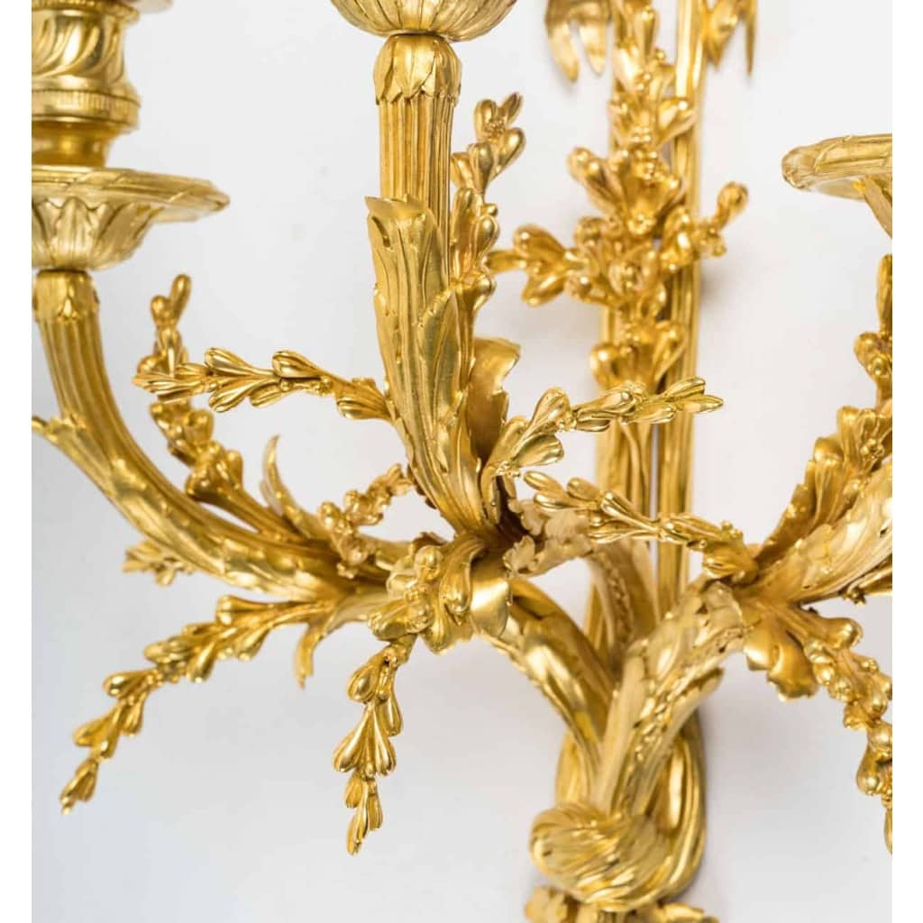 Paire d’appliques de style Louis XVI datées de 1881. | Biron Paire d'appliques de style Louis XVI datées de 1881.
