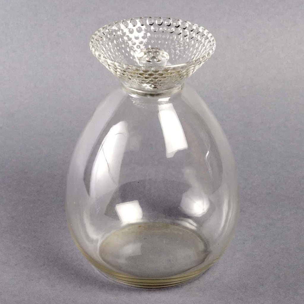 Service « Nippon » verre blanc 26 Pièces (24 Verres + 1 Broc + 1 Carafe) de René LALIQUE | Biron Service "Nippon" verre blanc 26 Pièces (24 Verres + 1 Broc + 1 Carafe) de René LALIQUE