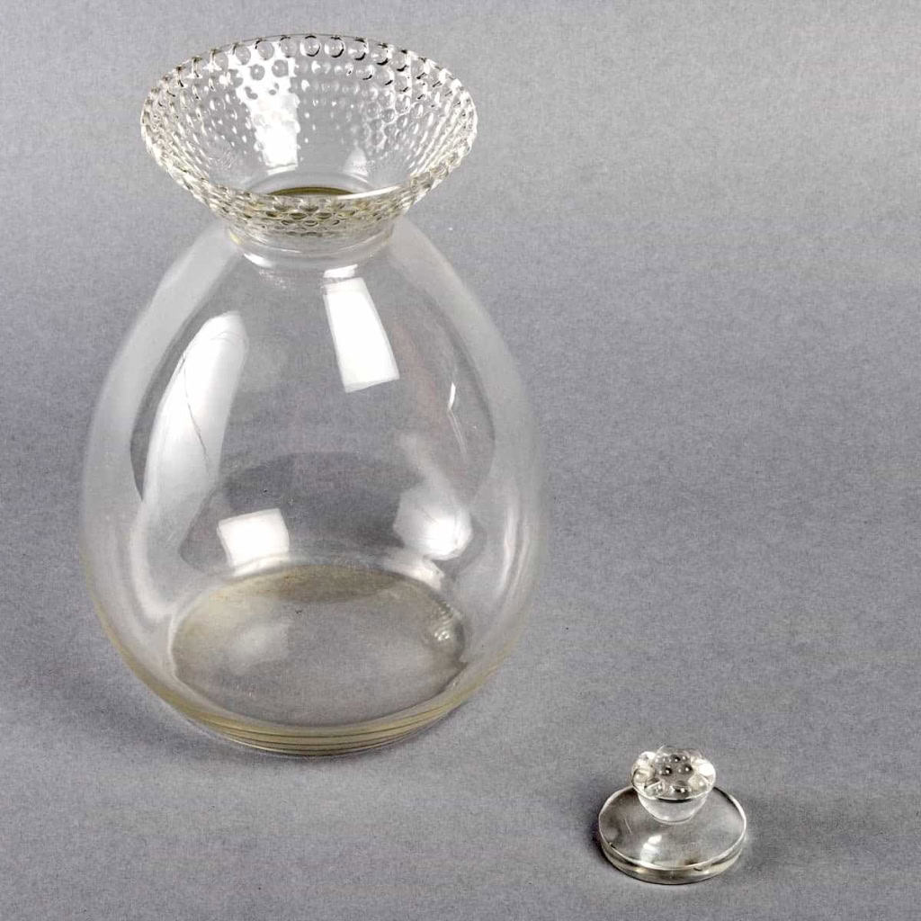 Service « Nippon » verre blanc 26 Pièces (24 Verres + 1 Broc + 1 Carafe) de René LALIQUE | Biron Service "Nippon" verre blanc 26 Pièces (24 Verres + 1 Broc + 1 Carafe) de René LALIQUE