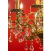 Lustre en bronze à 12 lumières, Louis XV, début XXème siècle | Biron Lustre en bronze à 12 lumières, Louis XV, début XXème siècle