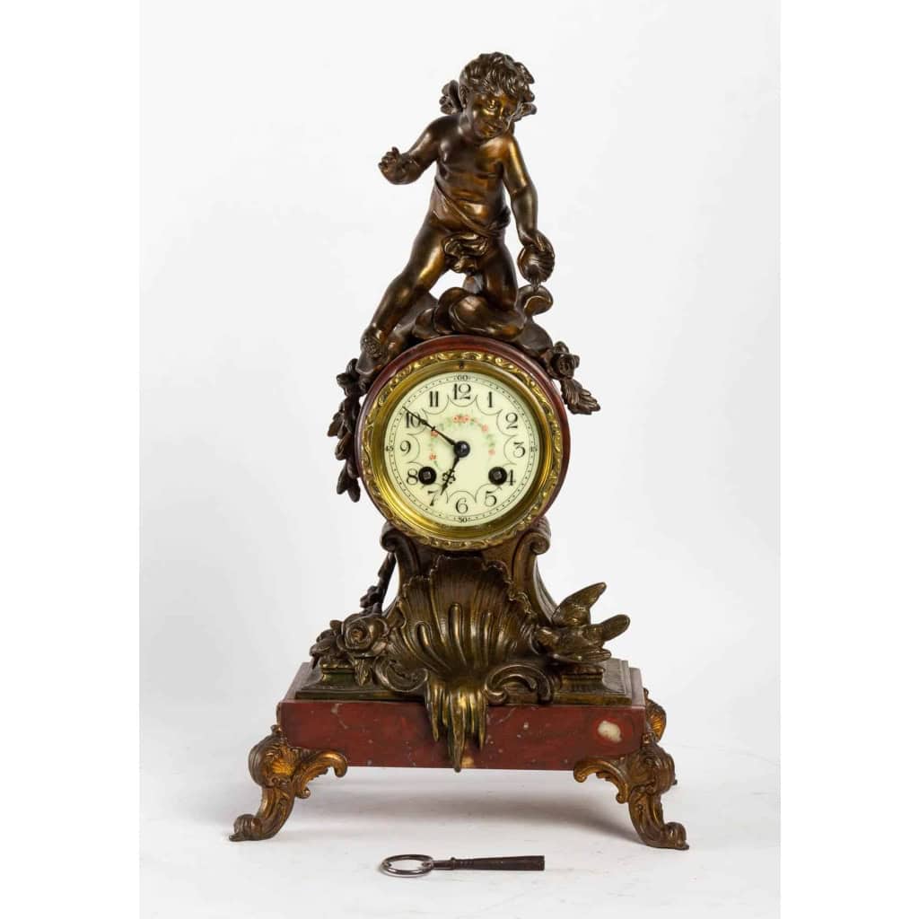 Pendule en bronze Griotte et régula avec sa clé du XIXème siècle | Biron |||||||||