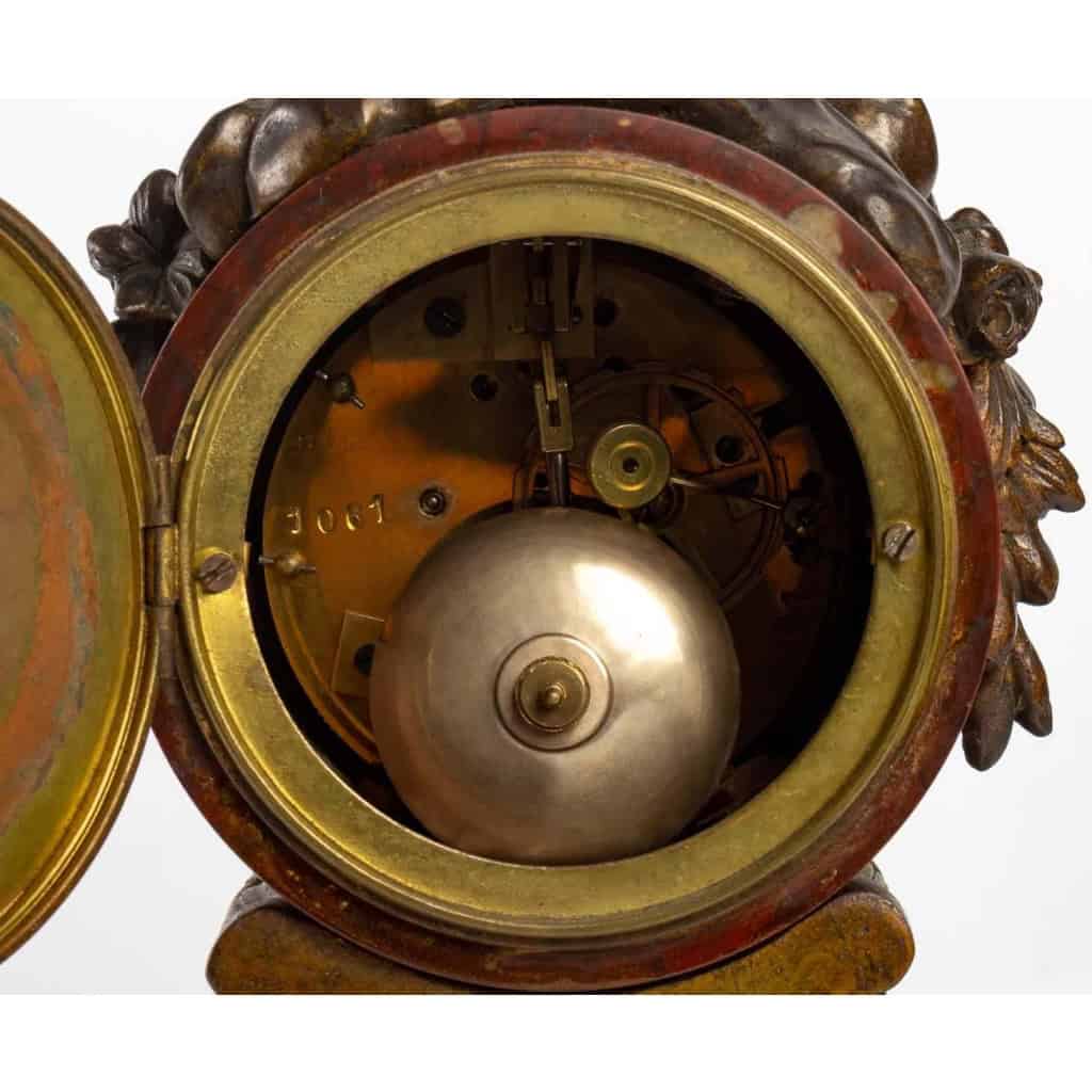 Pendule en bronze Griotte et régula avec sa clé du XIXème siècle | Biron Pendule en bronze Griotte et régula avec sa clé du XIXème siècle