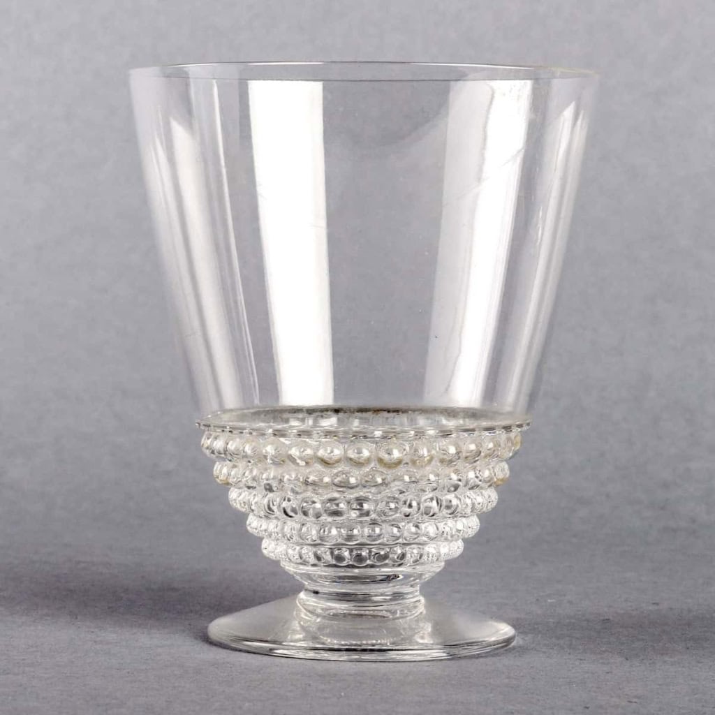 Service « Nippon » verre blanc 32 Pièces (30 Verres + 1 Broc + 1 Carafe) de René LALIQUE | Biron Service "Nippon" verre blanc 32 Pièces (30 Verres + 1 Broc + 1 Carafe) de René LALIQUE