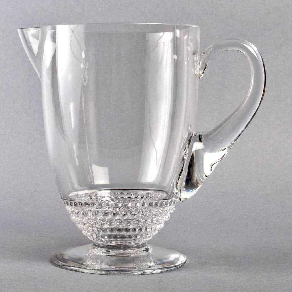 Service « Nippon » verre blanc 32 Pièces (30 Verres + 1 Broc + 1 Carafe) de René LALIQUE | Biron Service "Nippon" verre blanc 32 Pièces (30 Verres + 1 Broc + 1 Carafe) de René LALIQUE