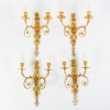Suite de quatre appliques de style Louis XVI. | Biron |||||