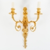Suite de quatre appliques de style Louis XVI. | Biron Suite de quatre appliques de style Louis XVI.