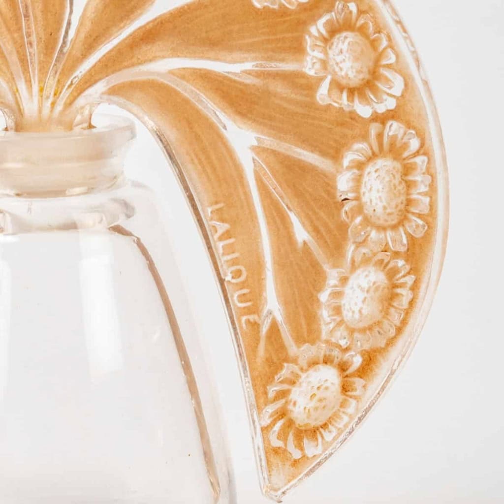 Flacon « Pâquerettes » verre blanc patiné sépia de René LALIQUE pour ROGER & GALLET | Biron Flacon "Pâquerettes" verre blanc patiné sépia de René LALIQUE pour ROGER & GALLET