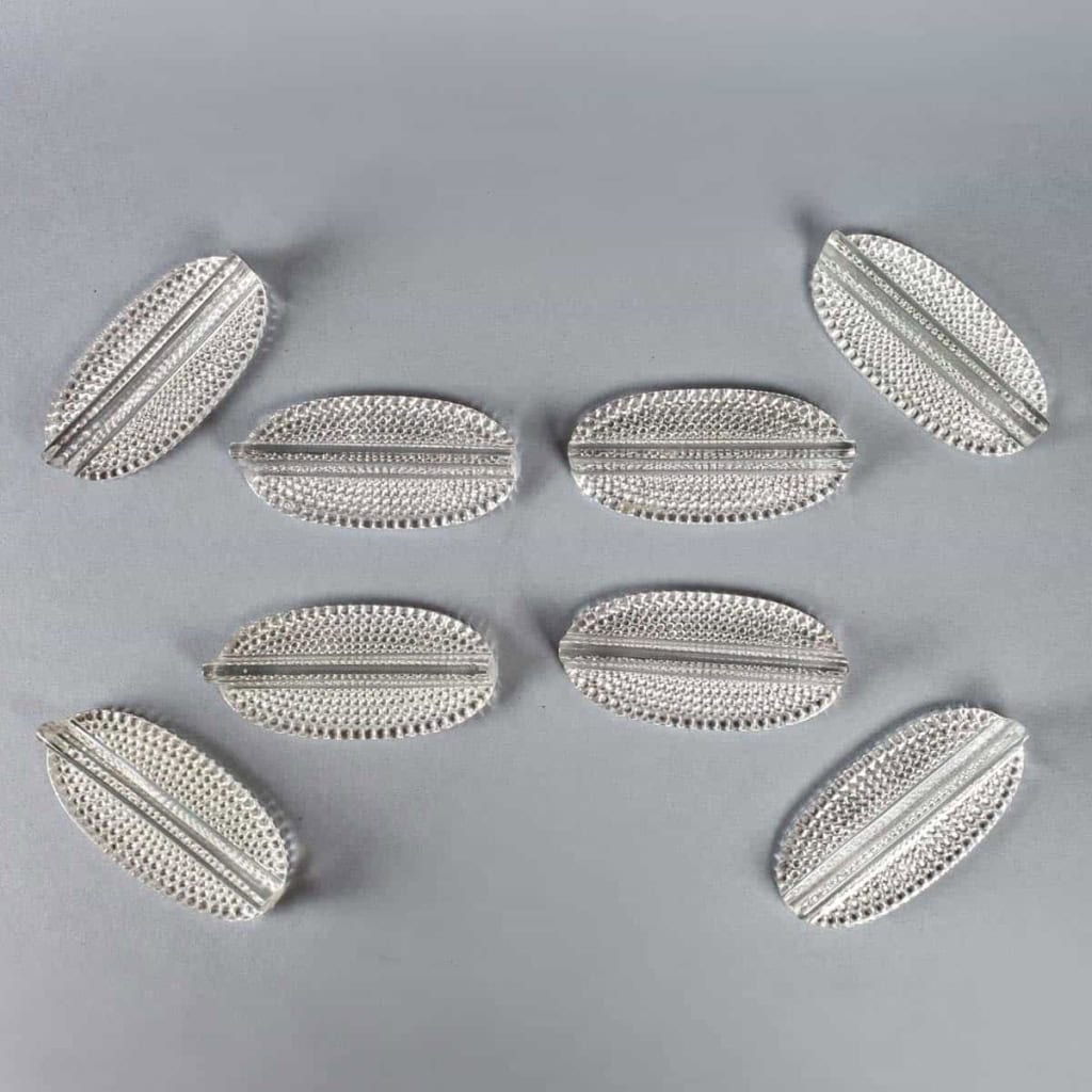 Suite de 8 Porte-Couteaux "Nippon" verre blanc de René LALIQUE