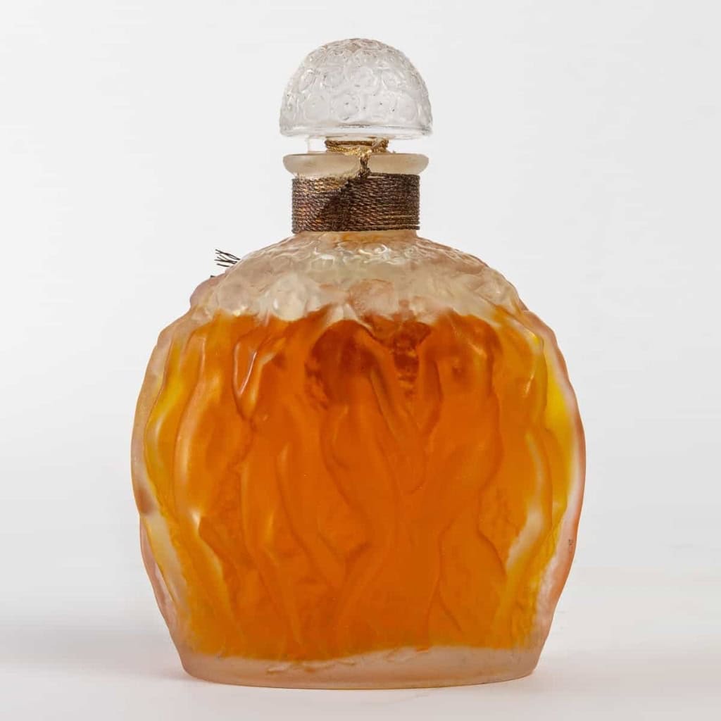 Flacon « Calendal » verre blanc de René LALIQUE pour MOLINARD | Biron Flacon "Calendal" verre blanc de René LALIQUE pour MOLINARD