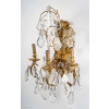 Paire d'appliques en bronze et cristal, style Louis XV