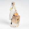 Le cuisinier, Meissen, « Les cris de Paris », XIXe siècle. | Biron Le cuisinier, Meissen, "Les cris de Paris", XIXe siècle.