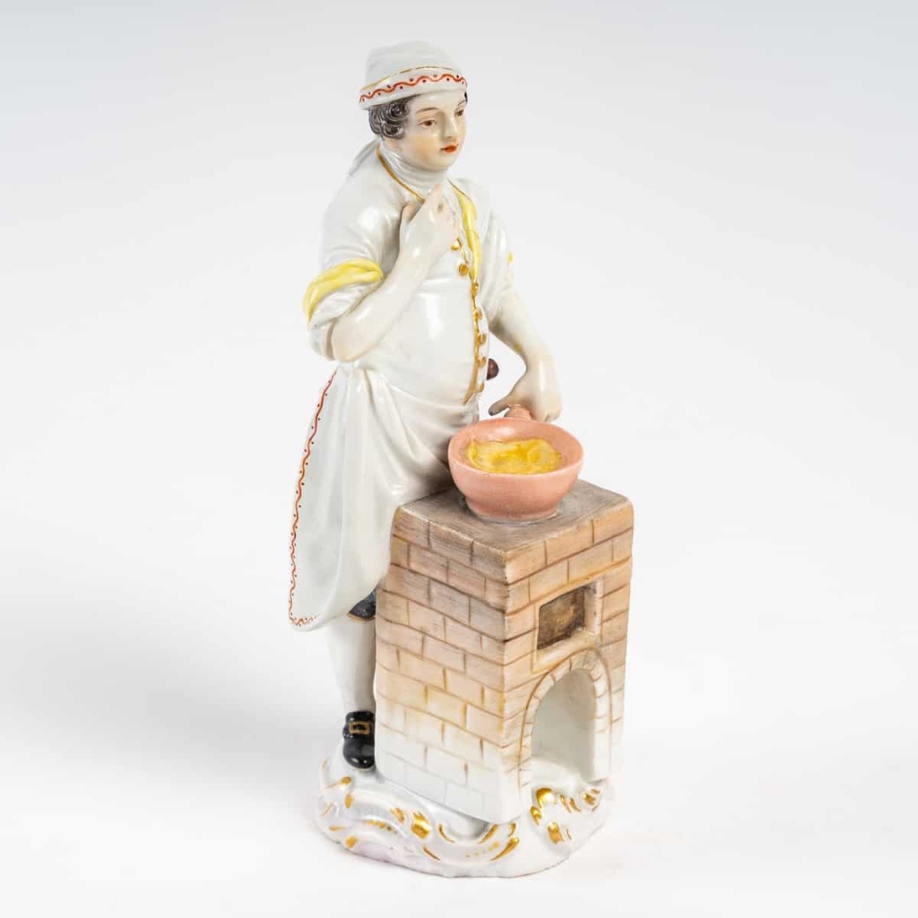 Le cuisinier, Meissen, « Les cris de Paris », XIXe siècle. | Biron Le cuisinier, Meissen, "Les cris de Paris", XIXe siècle.