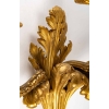 Série de quatre appliques en bronze doré. XIXème siècle.