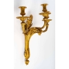 Série de quatre appliques en bronze doré. XIXème siècle.