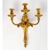 Série de quatre appliques en bronze doré. XIXème siècle.