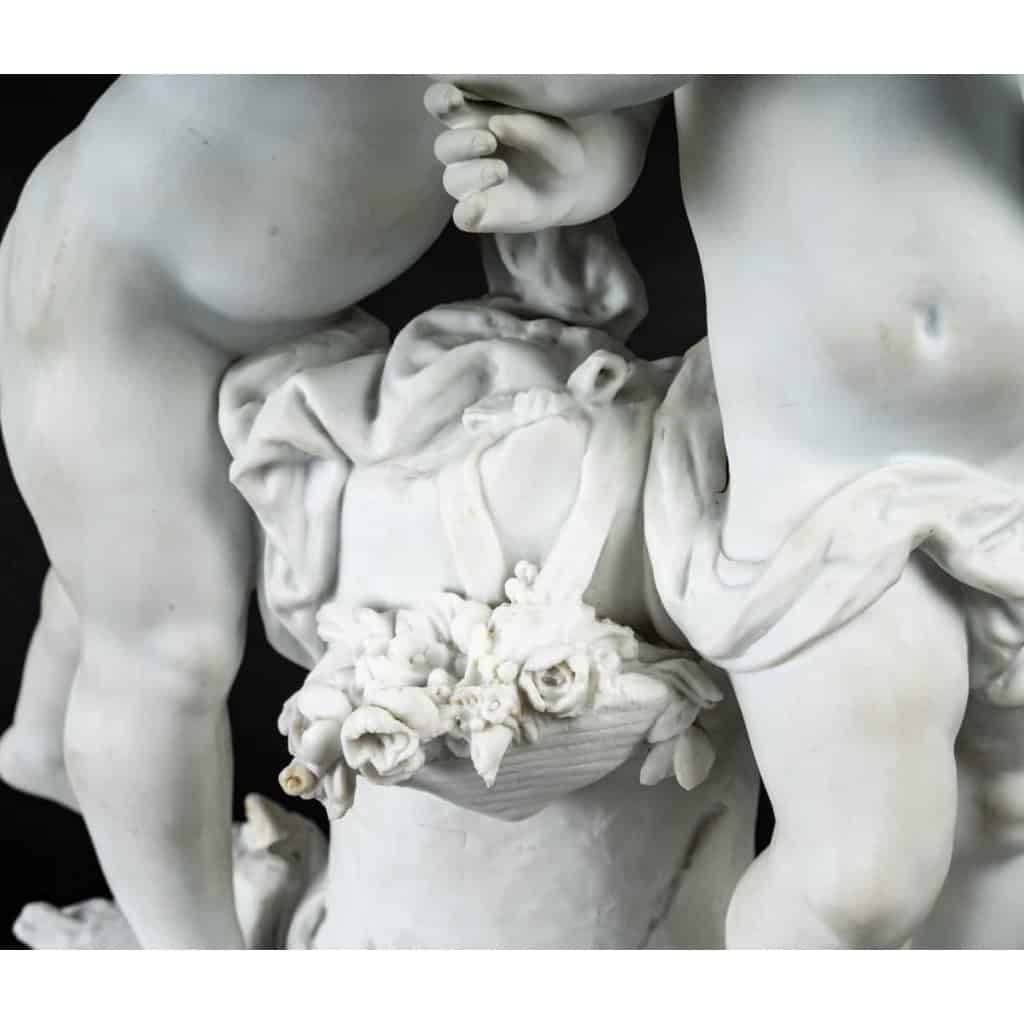 Sculpture biscuit « Amours aux fleurs » | Biron Sculpture biscuit "Amours aux fleurs"