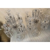 1950′ Paire de Chandeliers 4 Branches Socles Perlés Et Signés En Relief BACCARAT H 55 cm