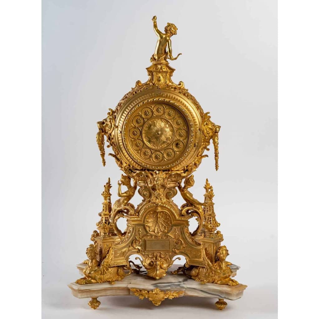 Une garniture de style renaissance en bronze doré fin XIXème siècle | Biron Une garniture de style renaissance en bronze doré fin XIXème siècle