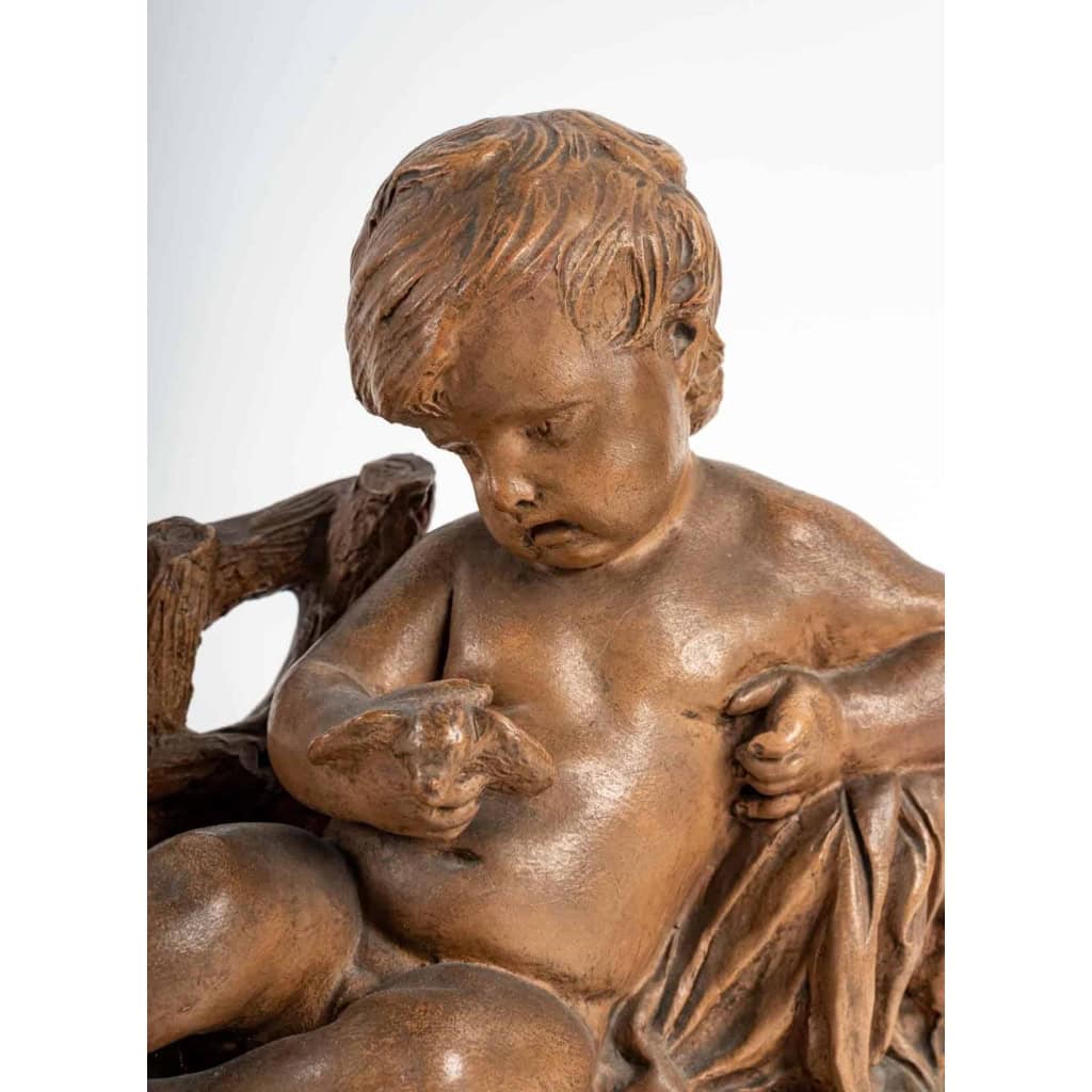 Terre Cuite Représentant un Enfant et un Oiseau, Début du XXème Siècle | Biron Terre Cuite Représentant un Enfant et un Oiseau, Début du XXème Siècle