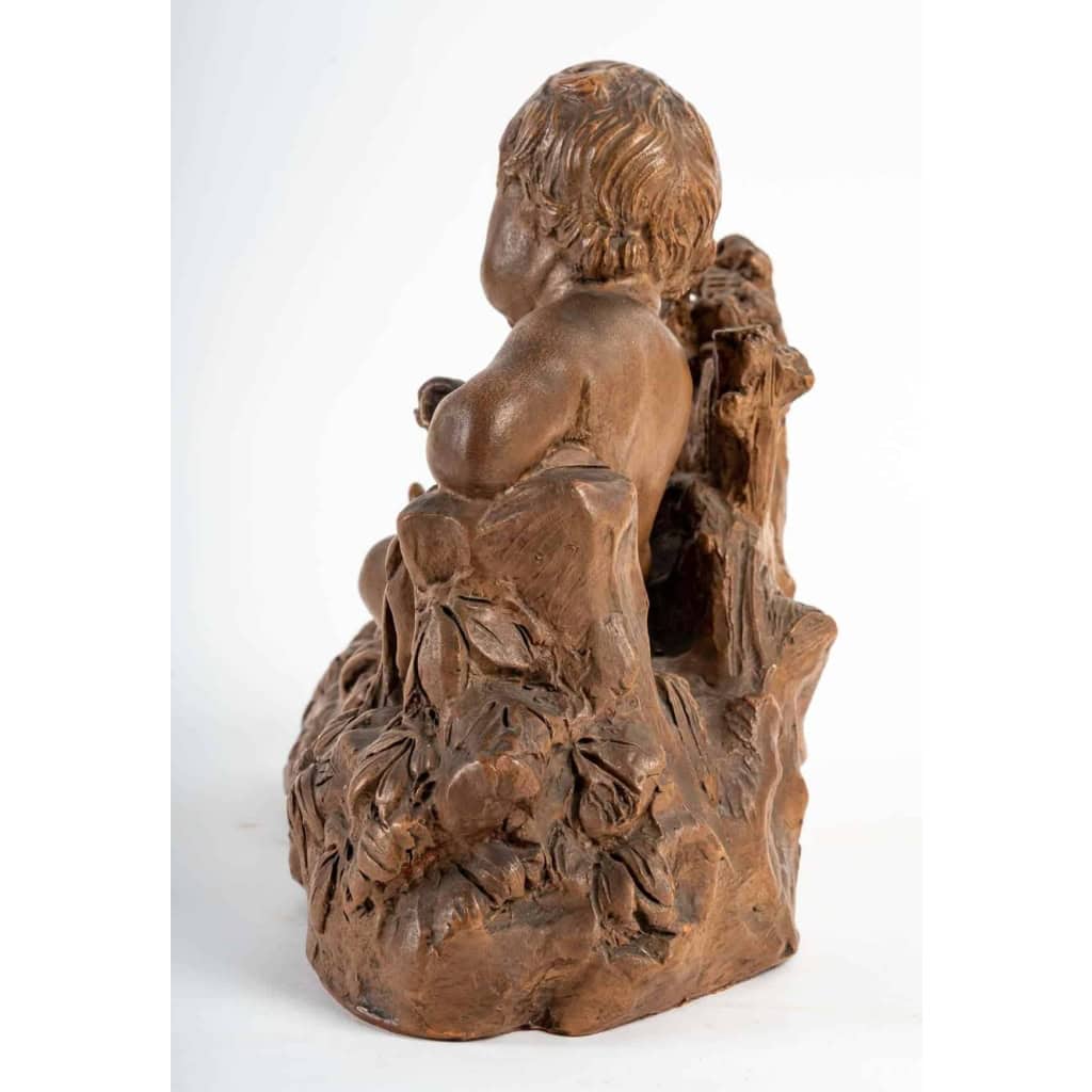 Terre Cuite Représentant un Enfant et un Oiseau, Début du XXème Siècle | Biron Terre Cuite Représentant un Enfant et un Oiseau, Début du XXème Siècle