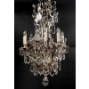 Important lustre avec cage en bronze argenté et cristaux a huit lumières et cinq poignards éclairants