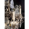 Important lustre avec cage en bronze argenté et cristaux a huit lumières et cinq poignards éclairants
