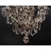 Important lustre avec cage en bronze argenté et cristaux a huit lumières et cinq poignards éclairants