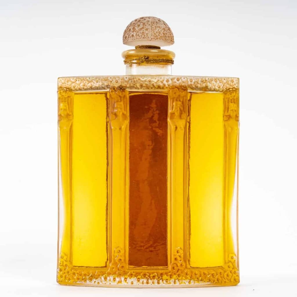 Flacon « Calendal » Verre Blanc Patiné Sépia de René LALIQUE pour Molinard | Biron Flacon « Calendal » Verre Blanc Patiné Sépia de René LALIQUE pour Molinard