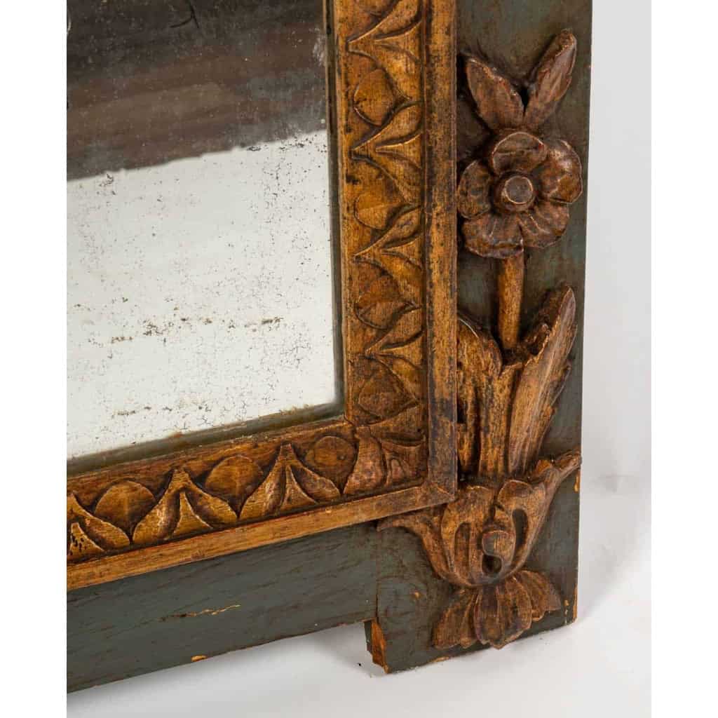 Important miroir en bois sculpté, doré et peint de style Louis XVI, fin XIXème siècle | Biron Important miroir en bois sculpté, doré et peint de style Louis XVI, fin XIXème siècle