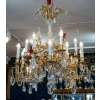 Un lustre en bronze doré à douze bras de lumières fin XIXème siècle | Biron Un lustre en bronze doré à douze bras de lumières fin XIXème siècle