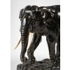 Sculpture en bronze et ivoire, Éléphant en marche, signée Boudarel | Biron Sculpture en bronze et ivoire, Éléphant en marche, signée Boudarel