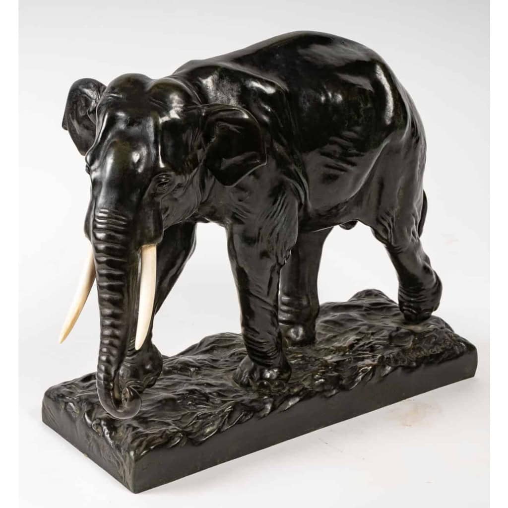 Sculpture en bronze et ivoire, Éléphant en marche, signée Boudarel | Biron Sculpture en bronze et ivoire, Éléphant en marche, signée Boudarel