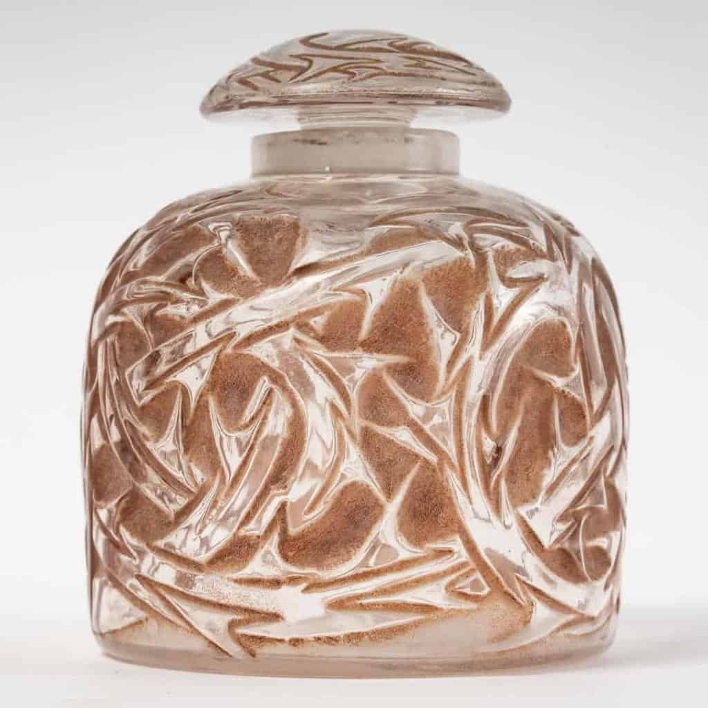 Partie de Garniture de Toilette « Epines » verre blanc patiné sépia de René LALIQUE – 4 pièces | Biron Partie de Garniture de Toilette "Epines" verre blanc patiné sépia de René LALIQUE - 4 pièces