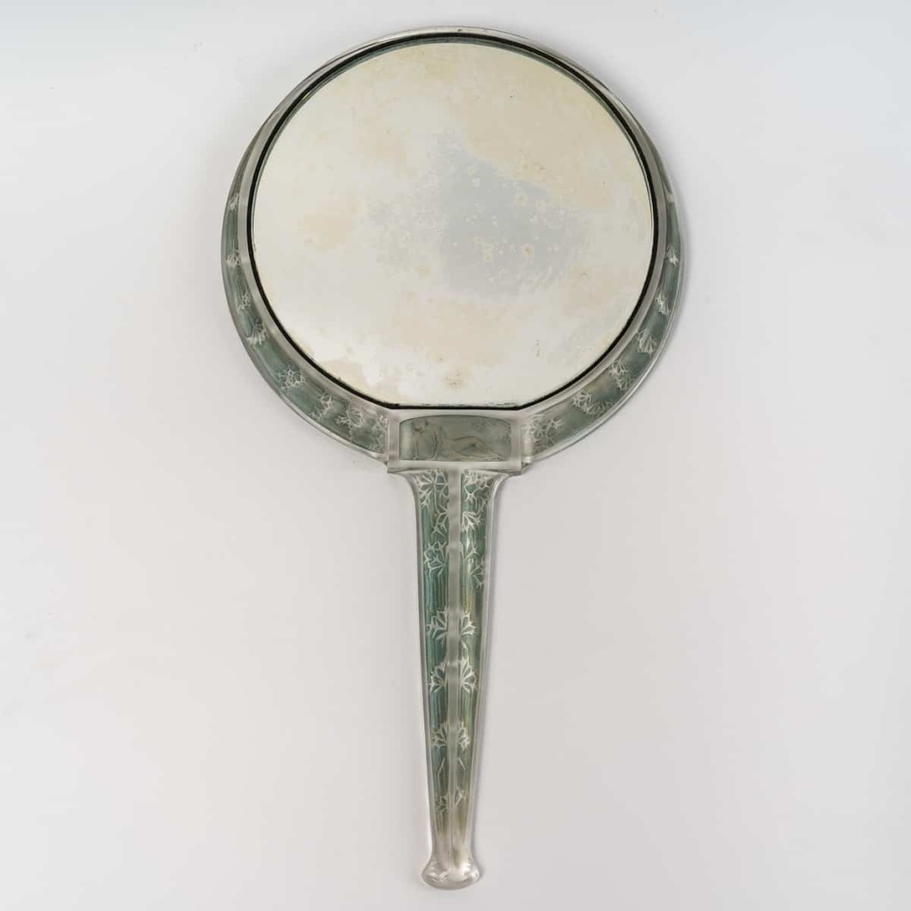 Miroir « Narcisse Couché » verre blanc patiné bleu vert de René LALIQUE | Biron Miroir "Narcisse Couché" verre blanc patiné bleu vert de René LALIQUE