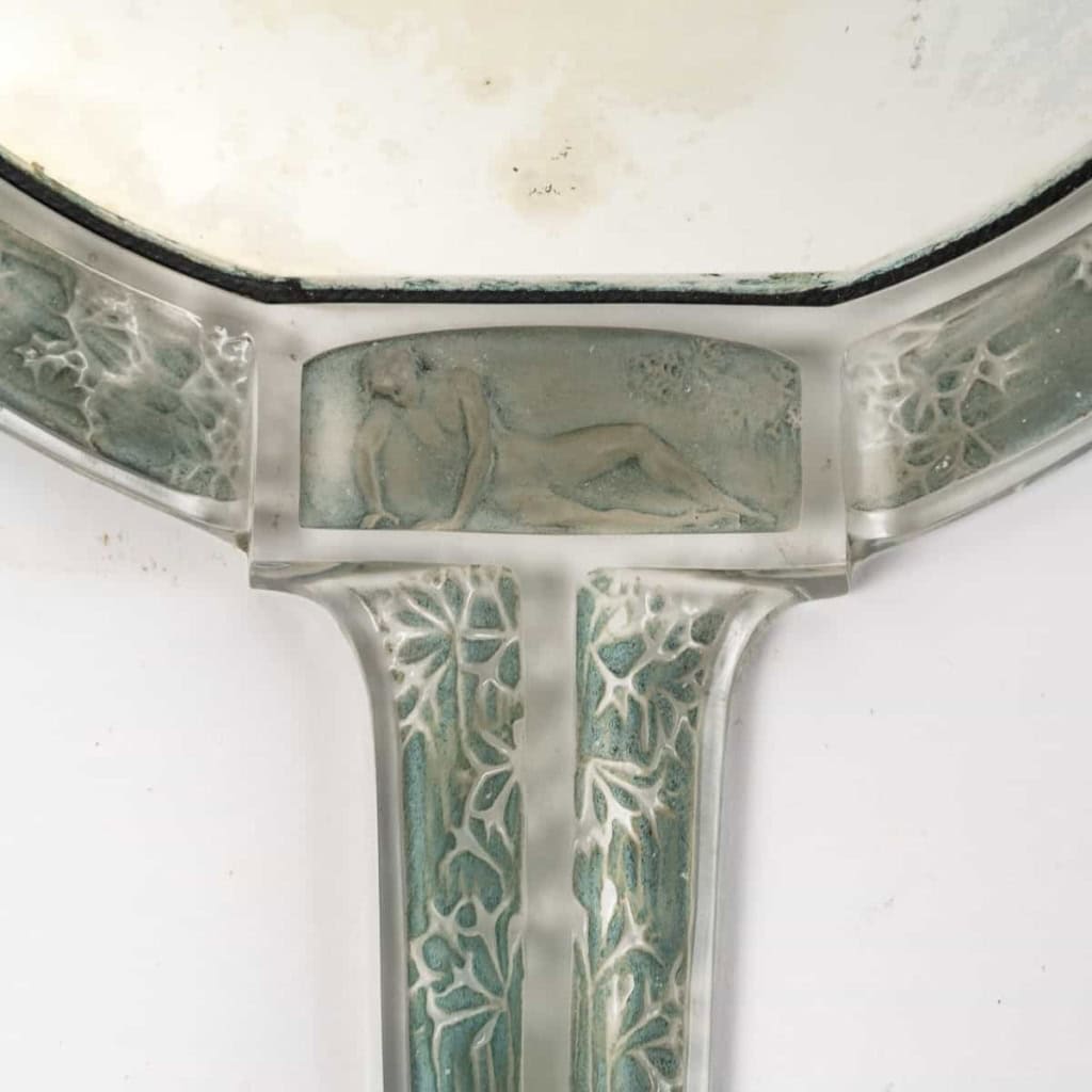 Miroir « Narcisse Couché » verre blanc patiné bleu vert de René LALIQUE | Biron Miroir "Narcisse Couché" verre blanc patiné bleu vert de René LALIQUE