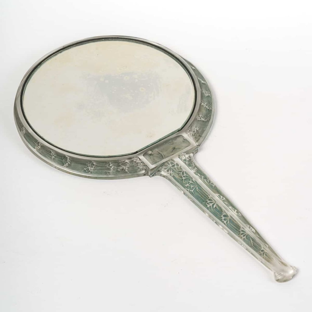 Miroir « Narcisse Couché » verre blanc patiné bleu vert de René LALIQUE | Biron Miroir "Narcisse Couché" verre blanc patiné bleu vert de René LALIQUE
