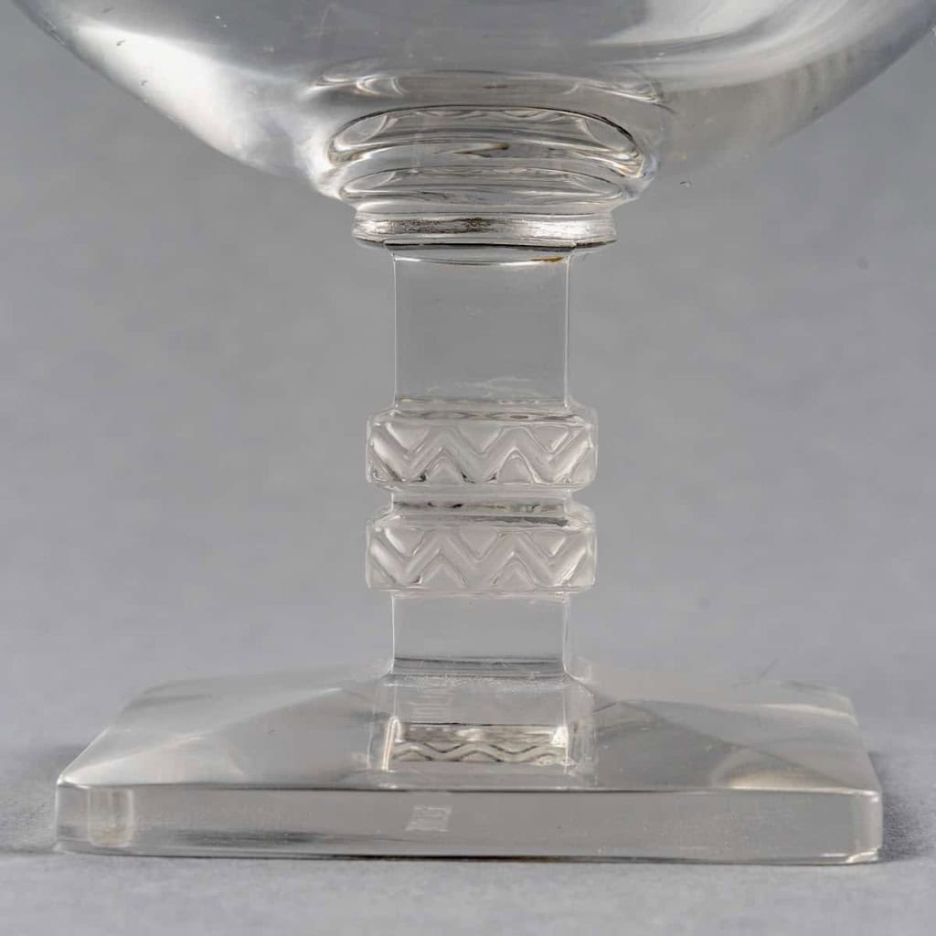 Suite de Verres à Cognac « Argos » verre blanc de René LALIQUE – 5 pièces | Biron Suite de Verres à Cognac "Argos" verre blanc de René LALIQUE - 5 pièces
