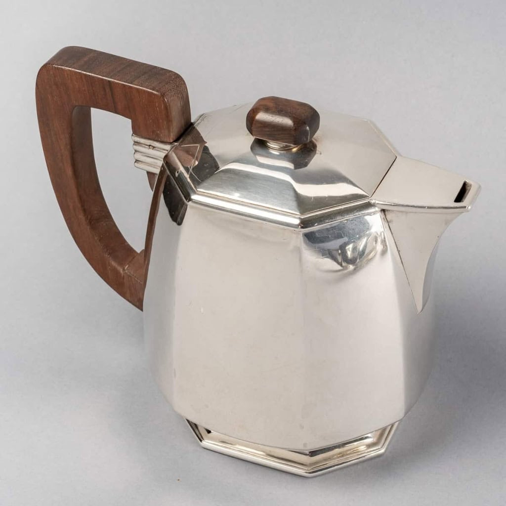 Service Thé et Café Pans Coupés argent massif prises en palissandre de Jean E. PUIFORCAT | Biron Service Thé et Café Pans Coupés argent massif prises en palissandre de Jean E. PUIFORCAT