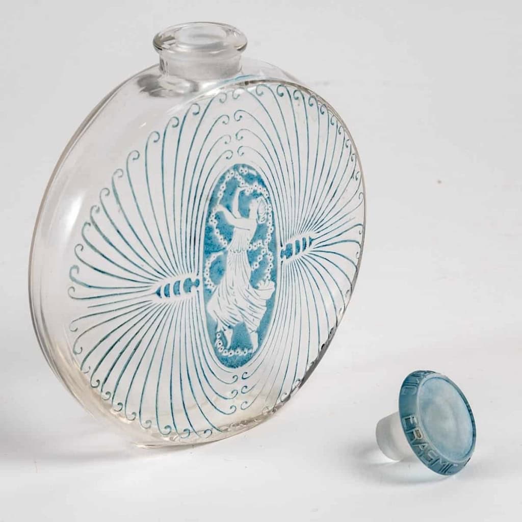 Flacon "De Lui" verre blanc patiné bleu de René LALIQUE pour Erasmic