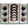 Série de tasses et sous-tasses en porcelaine de limoge, début XXème siècle | Biron Série de tasses et sous-tasses en porcelaine de limoge, début XXème siècle
