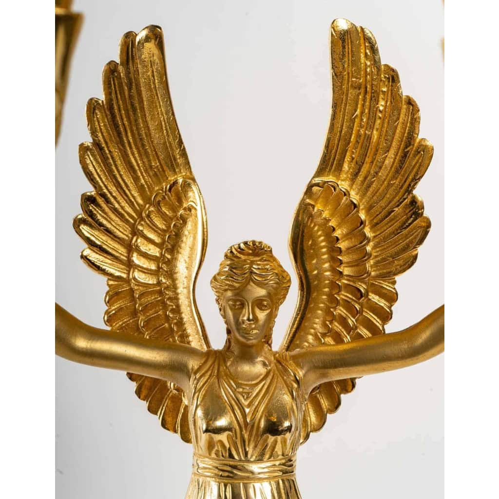 Paire de candélabres à 4 bras de lumières. XIXème siècle. | Biron Paire de candélabres à 4 bras de lumières. XIXème siècle.