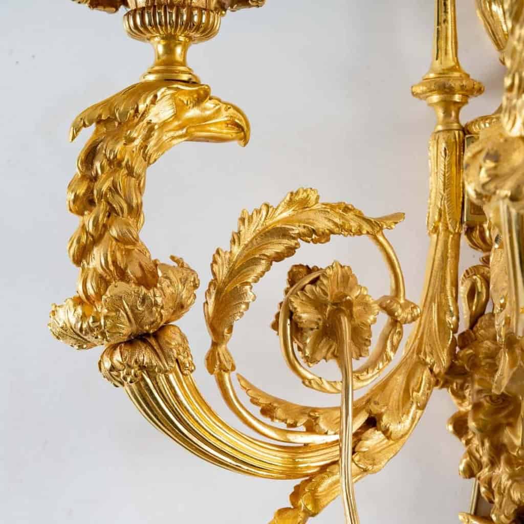 Paire d’appliques en bronze doré bien ciselé dans le style Louis XIV | Biron Paire d'appliques en bronze doré bien ciselé dans le style Louis XIV
