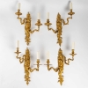 Suite de quatre appliques de style Régence. | Biron |||||