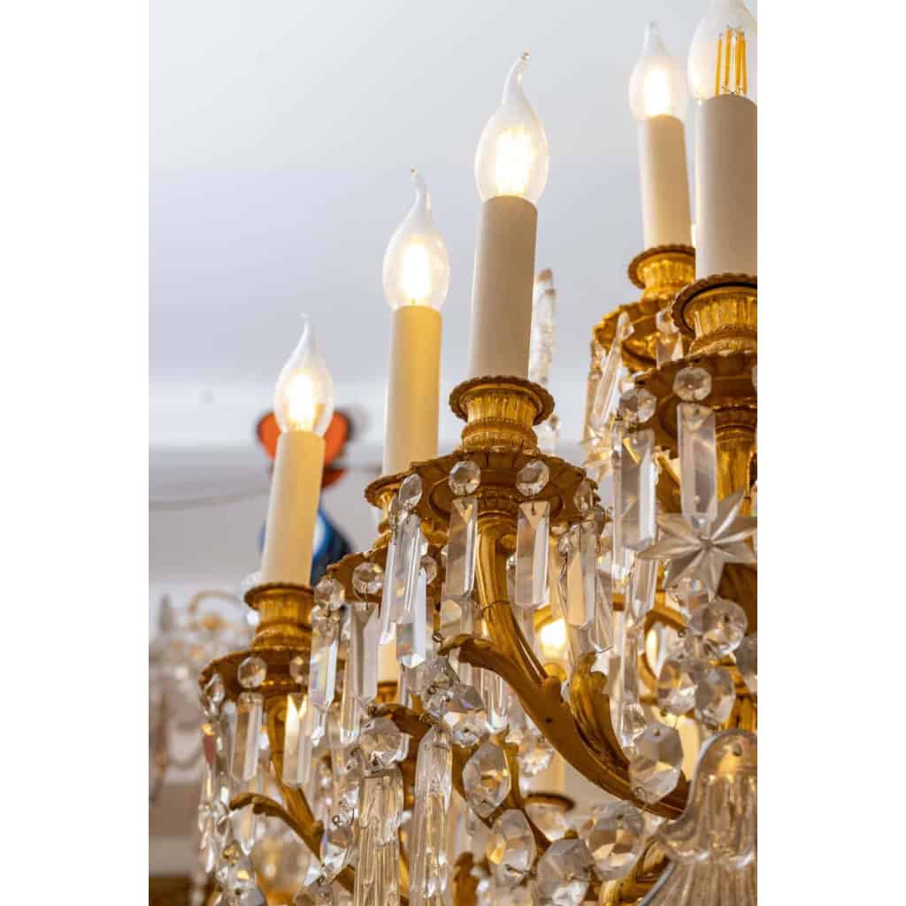 Lustre en bronze doré et cristal de Baccarat à 24 lumières, fin XIXème siècle | Biron Lustre en bronze doré et cristal de Baccarat à 24 lumières, fin XIXème siècle